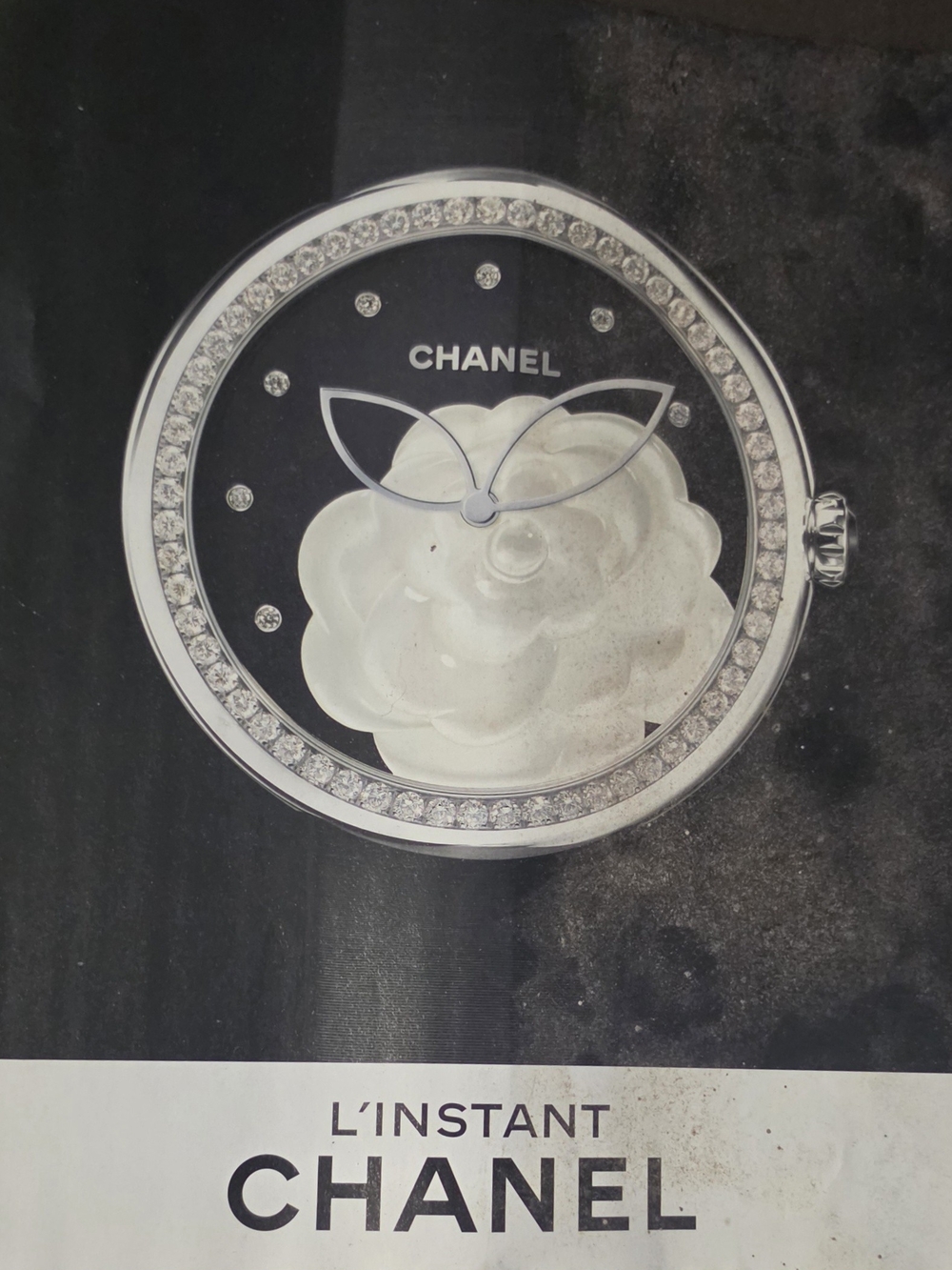 Print Ad Chanel Mademoiselle Privé wristwatch features a camellia flower motif